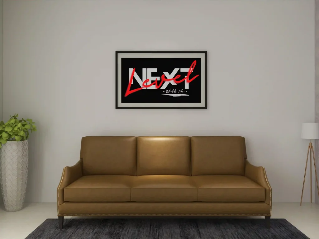 A sleek living area with a brown leather sofa and a black-framed typography print saying 'Next Level', highlighting minimalist wall frames for living room design.