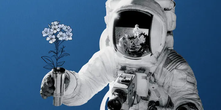 Astronaut holding flowers on blue background